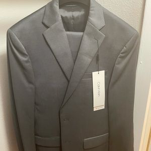 Brand new Calvin Klein grey slim fit suit